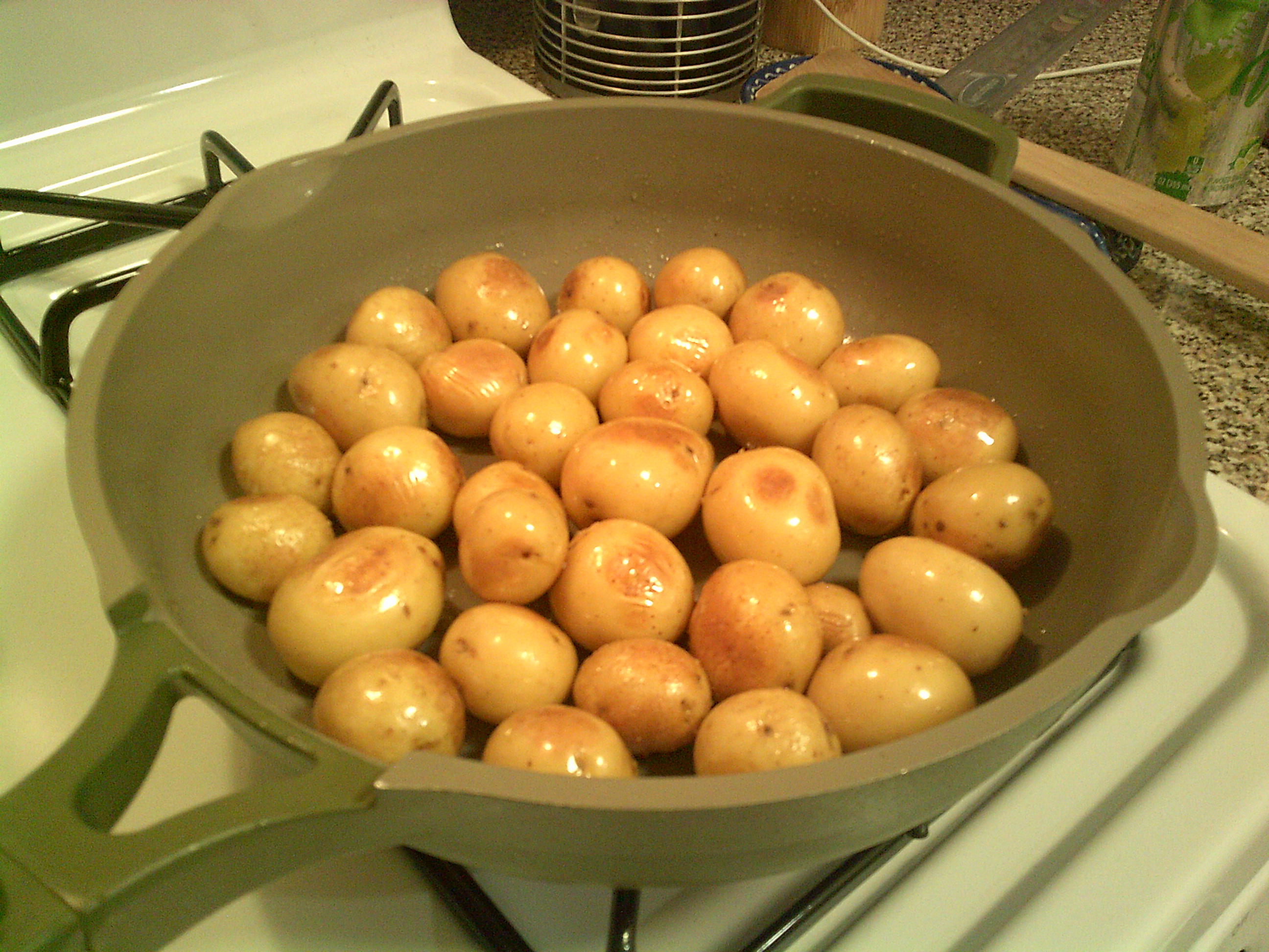 potatoes roasting in saute pan